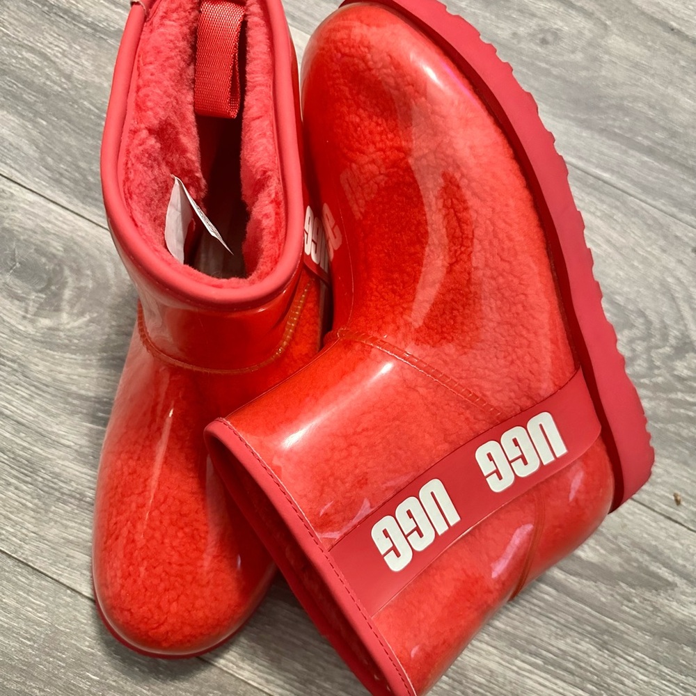 Ugg rain boots with fur inside I tried on in house. In new condition. Retai $250